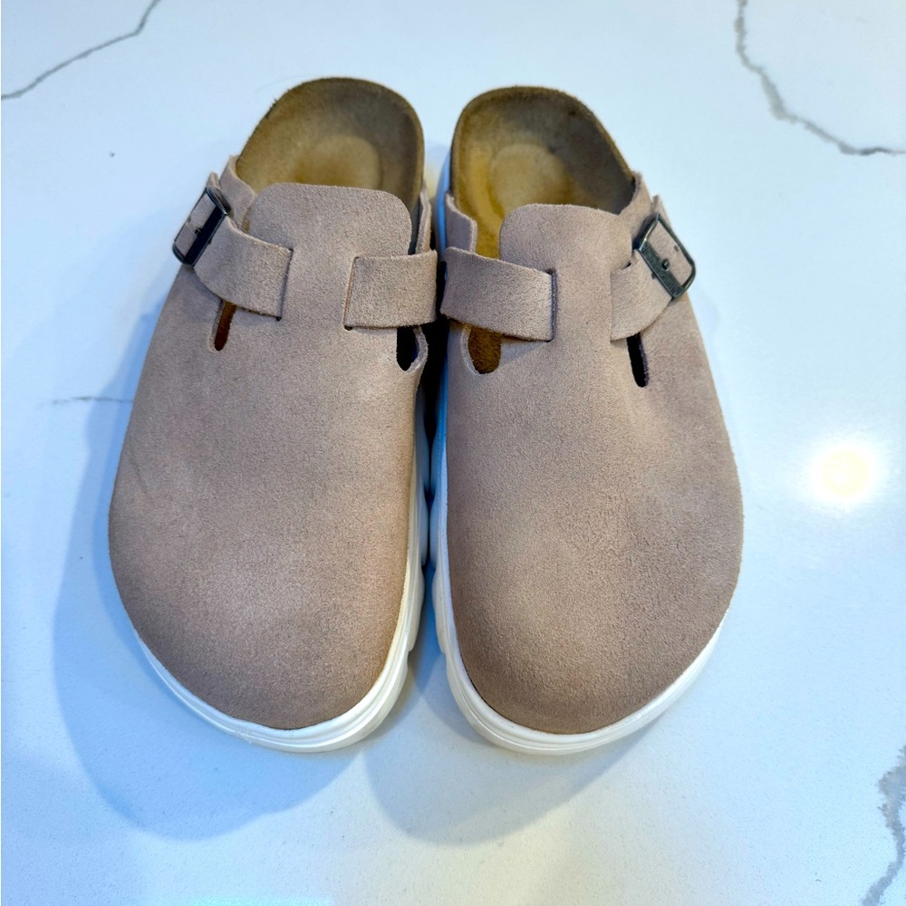 Birkenstock Papillio slip-ons in beautiful neutral color with white soles.